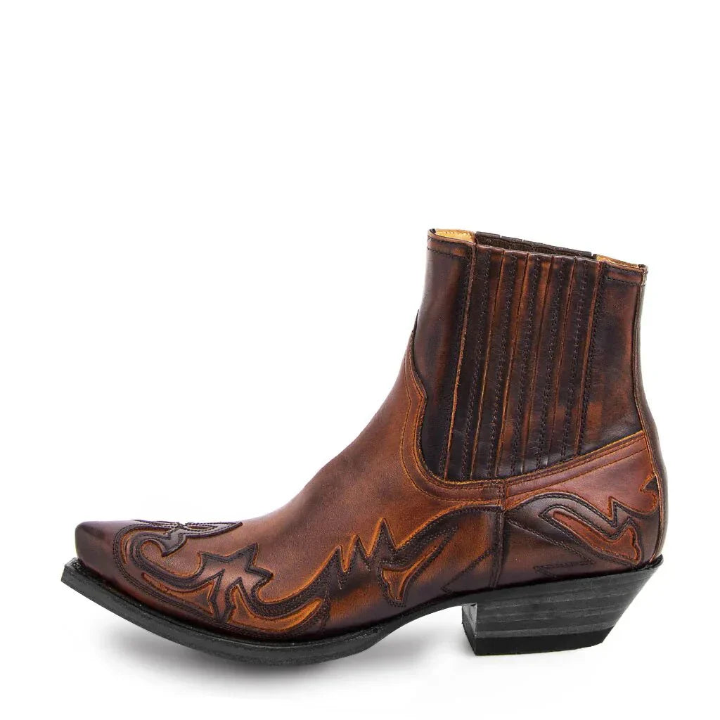 Chic women's mid-calf pull-on cowboy boots featuring stylish pointed toe and detailed western embroidery.