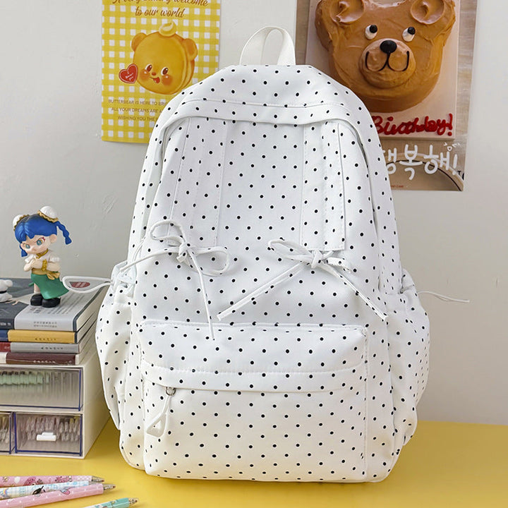 Cute polka dot backpack for women, perfect for school, travel, or everyday casual use.