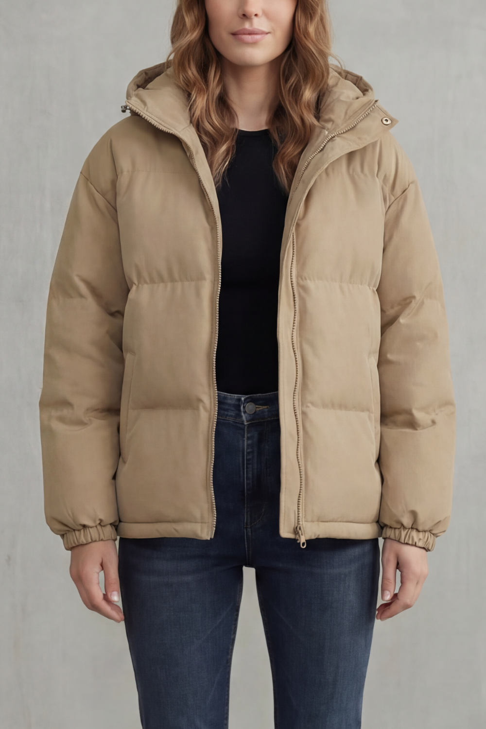 Chic women's quilted puffer jacket, featuring a warm hood. Ideal for stylish, casual winter outerwear.