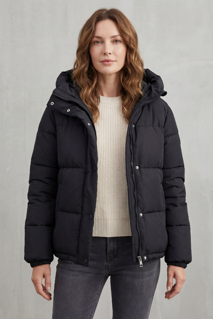 Stylish women's quilted puffer jacket, perfect lightweight outerwear for casual everyday style.