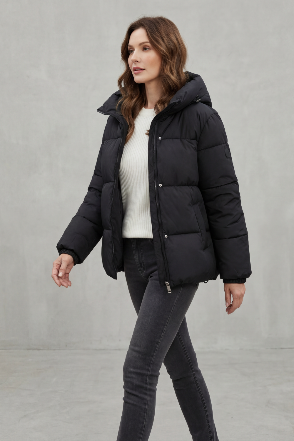 Warm, lightweight women's puffer jacket with elegant quilted design, ideal for winter layering.