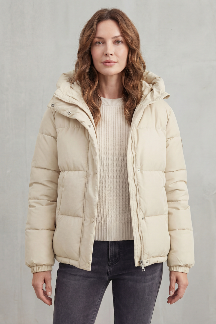 Versatile women's quilted puffer jacket, a lightweight & warm layering piece for winter fashion.