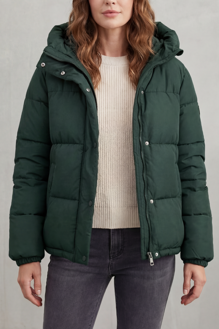 Women's premium quilted puffer jacket, offering warmth and a stylish, lightweight fit for cold weather.