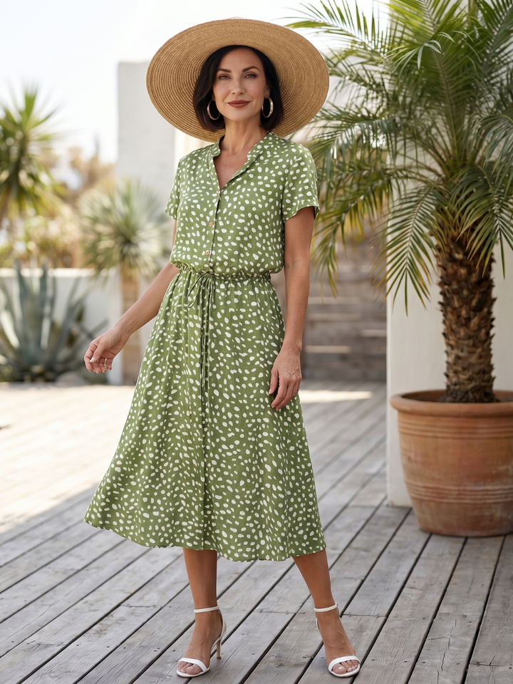 Women's printed button front belted midi dress. Short sleeve, casual summer style.