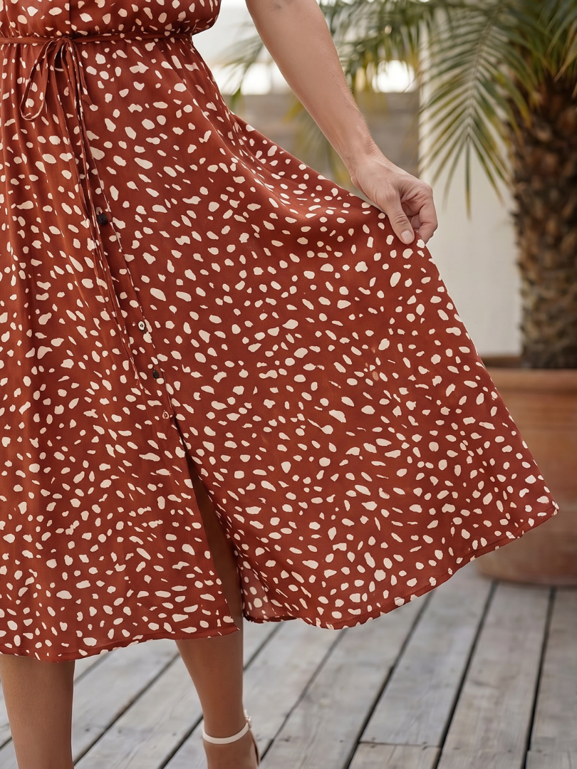 Summer printed midi dress for women. Short sleeve, button front, belted, casual and relaxed fit.