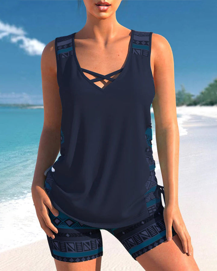 Chic women's swimwear: printed criss cross neck tankini, perfect for vacation fashion.