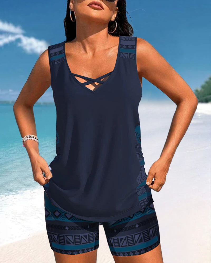 Comfortable women's printed tankini swimsuit with stylish criss cross neck detail.