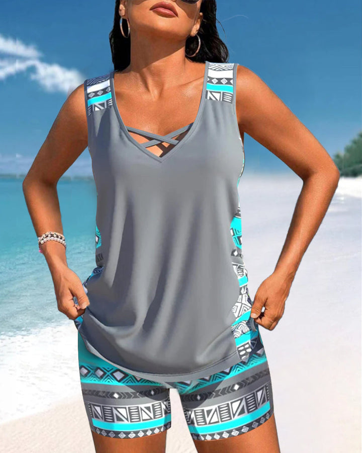 Printed ladies' criss cross neck tankini for beach vacations & poolside relaxation.