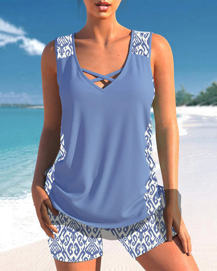 Vibrant printed criss cross neck tankini swimsuit for women's ultimate beach style.