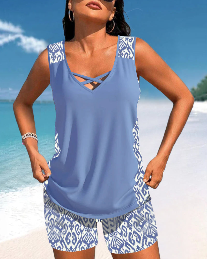 Women's printed two-piece tankini set with a flattering criss cross neck design.