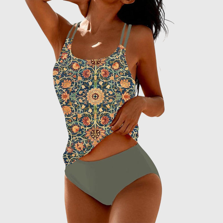 Women's printed strappy tankini swimsuit. Stylish two-piece swimwear perfect for summer beach & vacation. Vibrant colors.