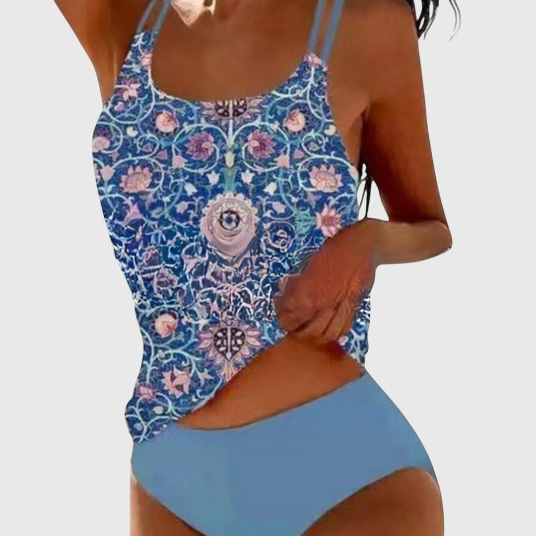 Stylish women's printed tankini swimsuit. Two-piece set with a strappy top, great for summer beach & pool days.