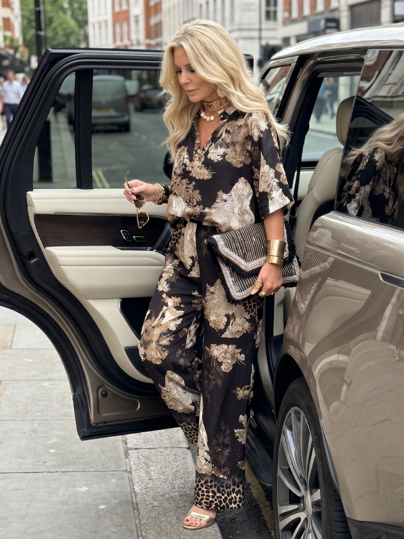 Casual chic women's matching set: printed wrap top & comfortable wide leg pants for everyday style.