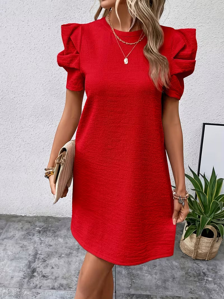 Women's Puff Sleeve Mini Dress, perfect for summer casual wear. Features a flattering fit & chic style.