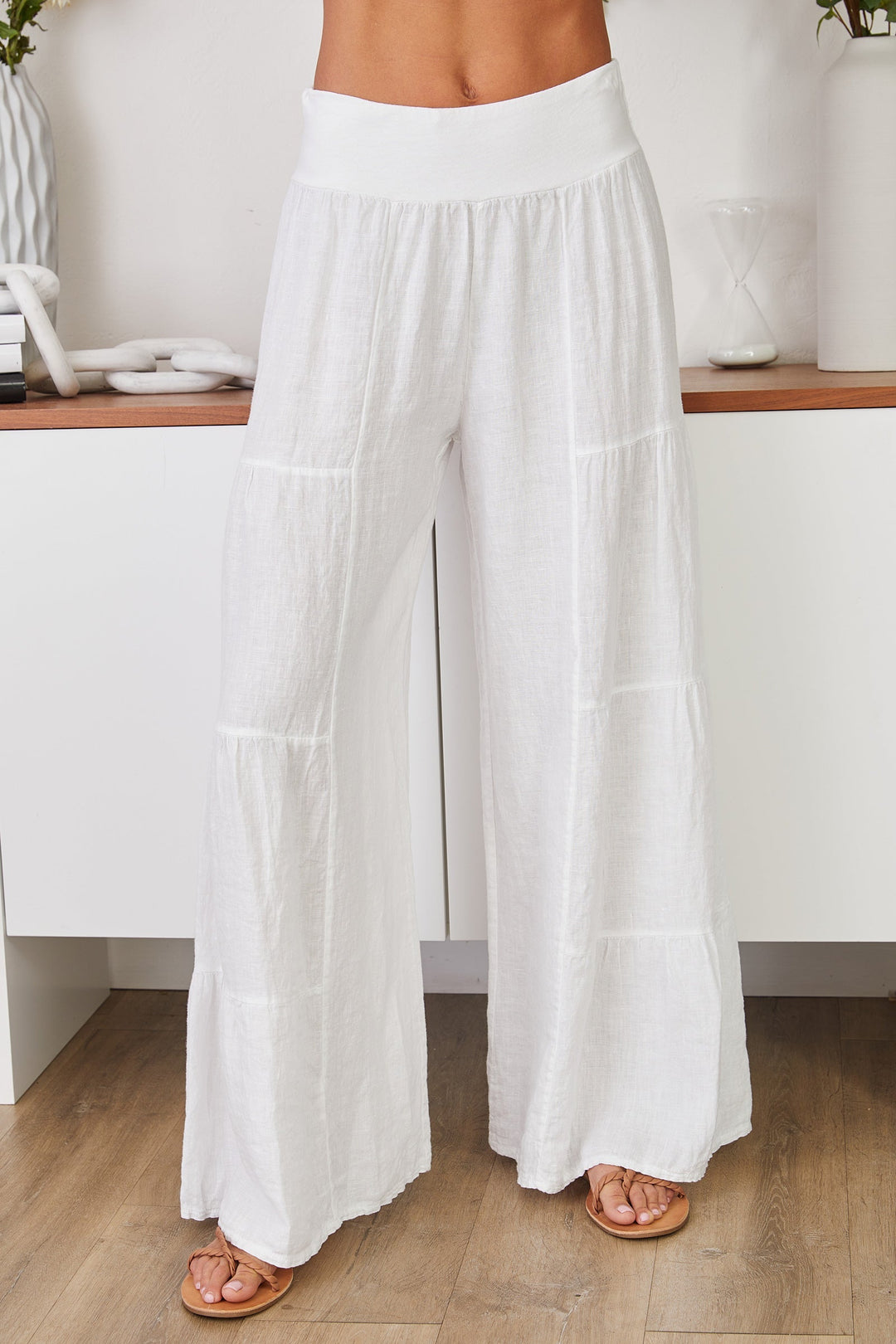 Women's pure linen palazzo pants, wide leg and tiered for comfort and style.