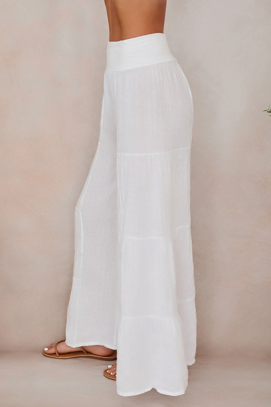 Women's comfortable tiered wide leg linen palazzo pants, elastic waist for ease.