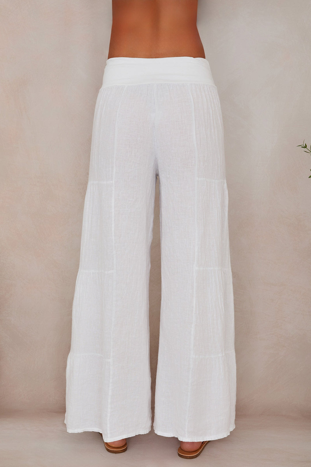 Chic women's wide leg linen palazzo pants, tiered design for casual elegance.