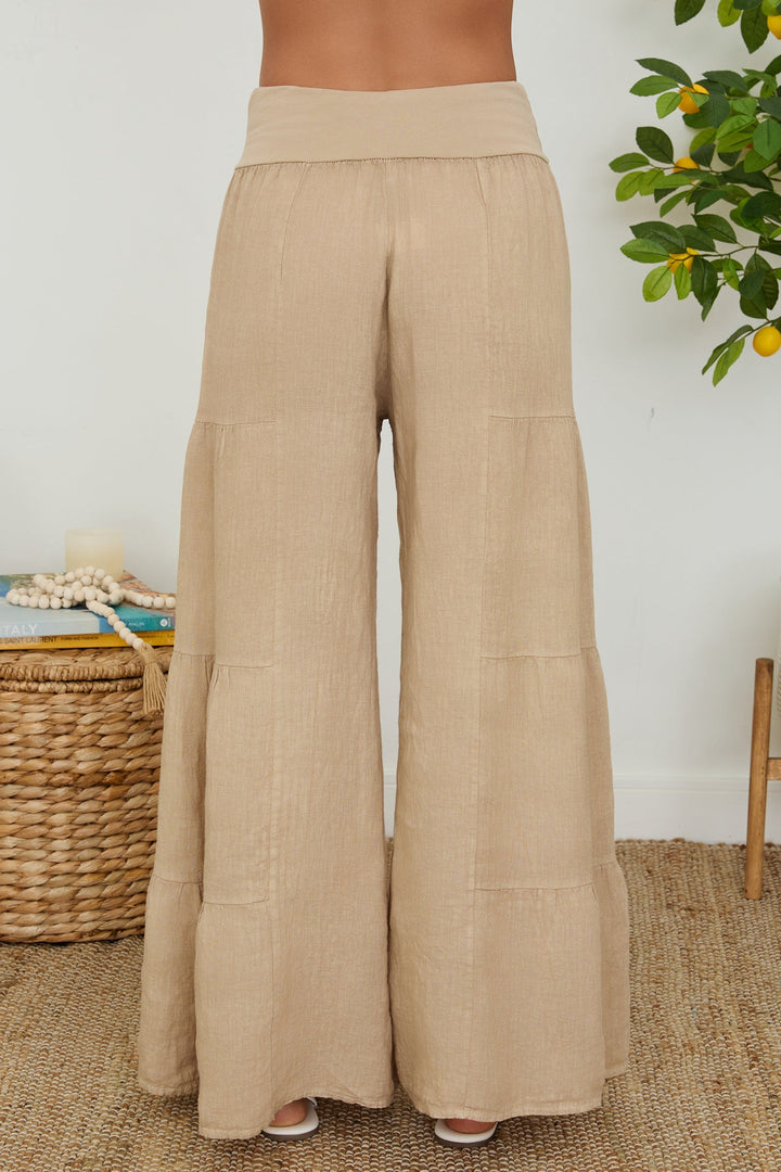 Women's wide leg tiered linen palazzo pants with elastic waist for maximum comfort.