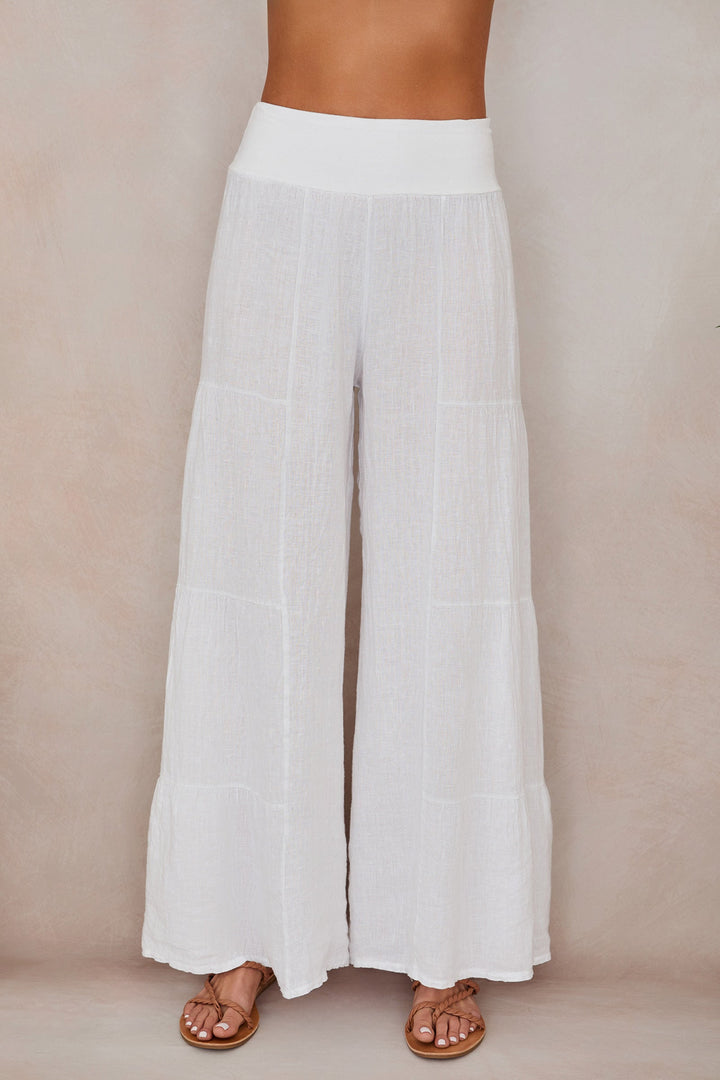 Flowy wide leg linen palazzo pants for women, tiered design for a chic look.