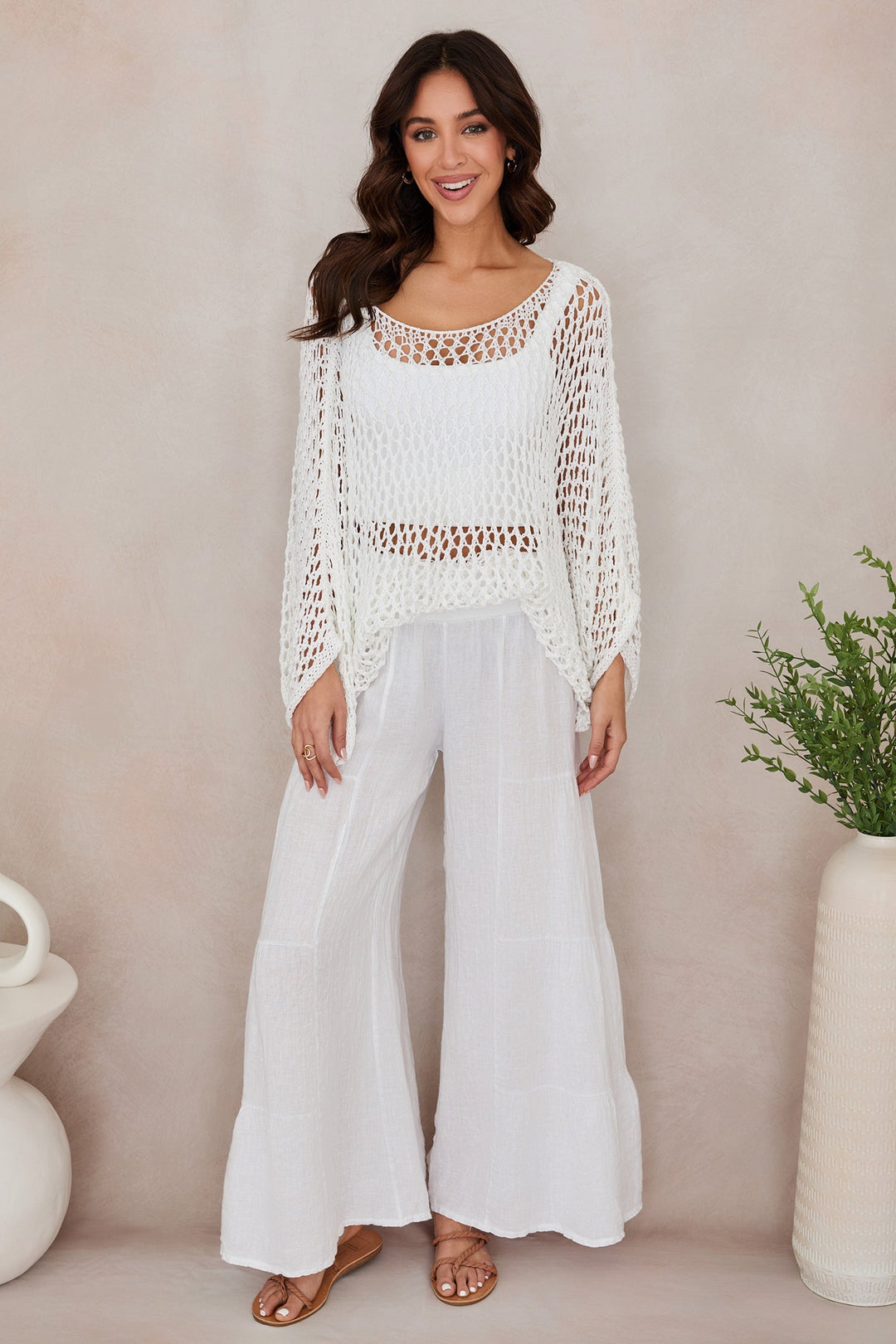 Women's summer fashion linen palazzo pants, wide leg and comfortable tiered fit.