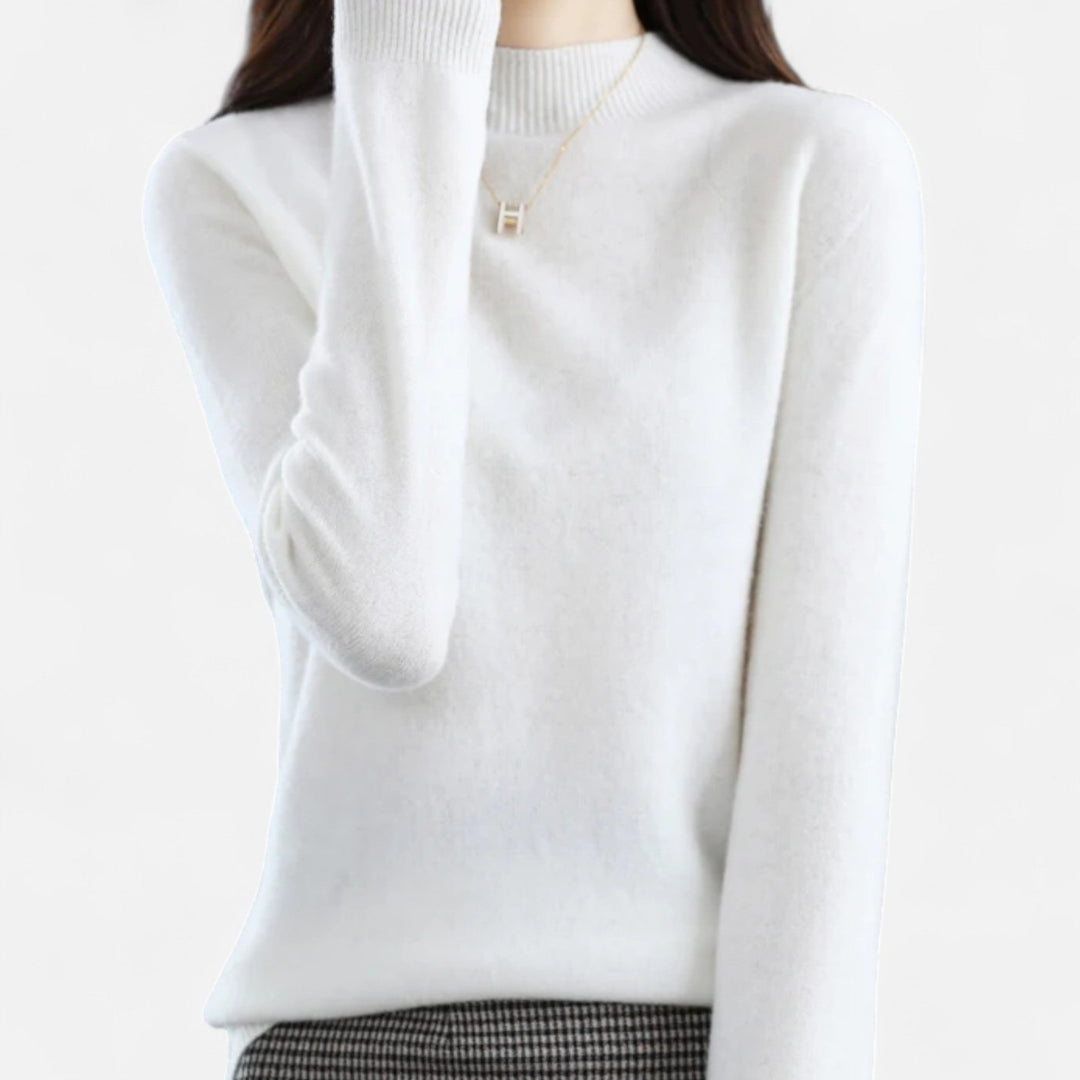 Model wearing an elegant women's pure wool half-neck sweater in a chic winter outfit