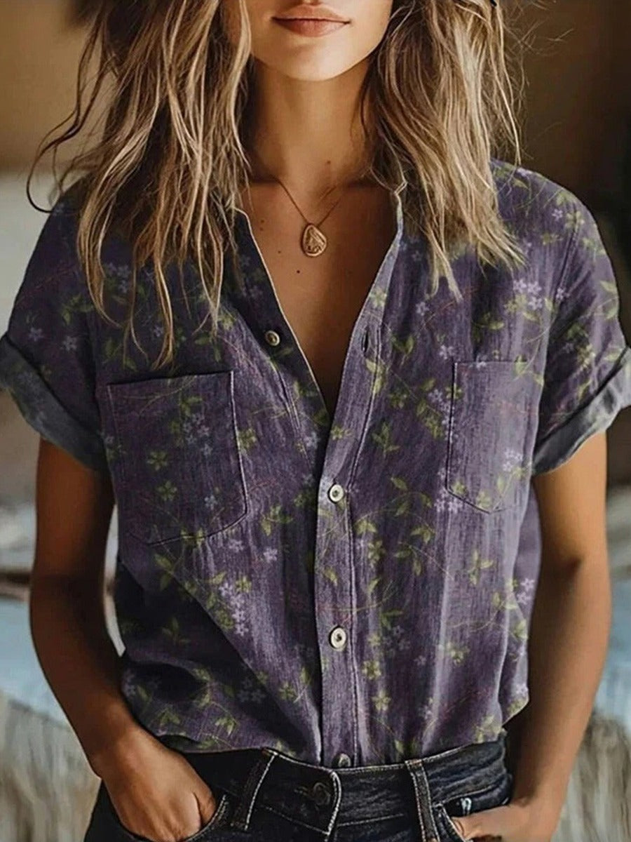 Women's purple collared buttoned pocketed rolled short sleeve blouse, ideal for summer casual & workwear.