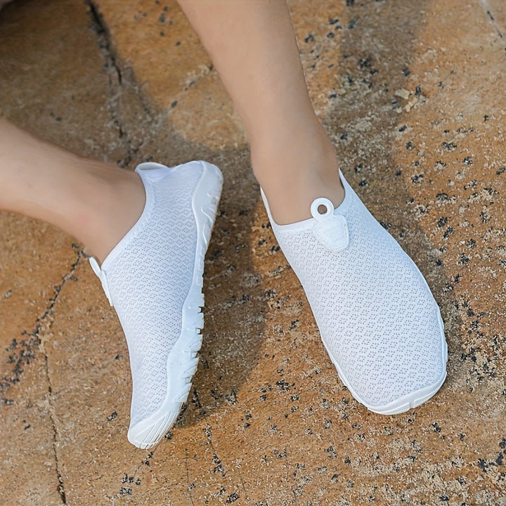 Breathable women's aqua socks, ideal for kayaking and paddleboarding