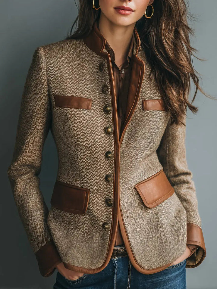 Women's quilted button-up blazer with stylish leather trim, perfect for tailored vintage looks.