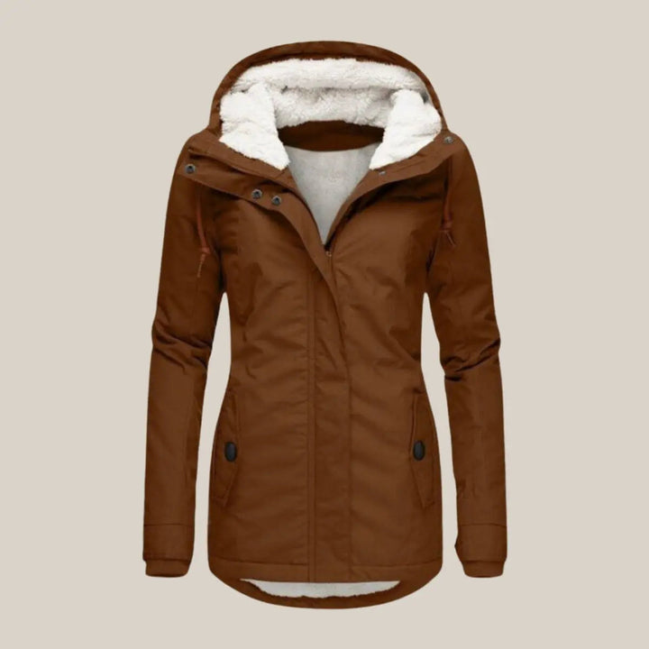 Plush fleece-lined women's hooded quilted jacket, cozy for autumn & winter.