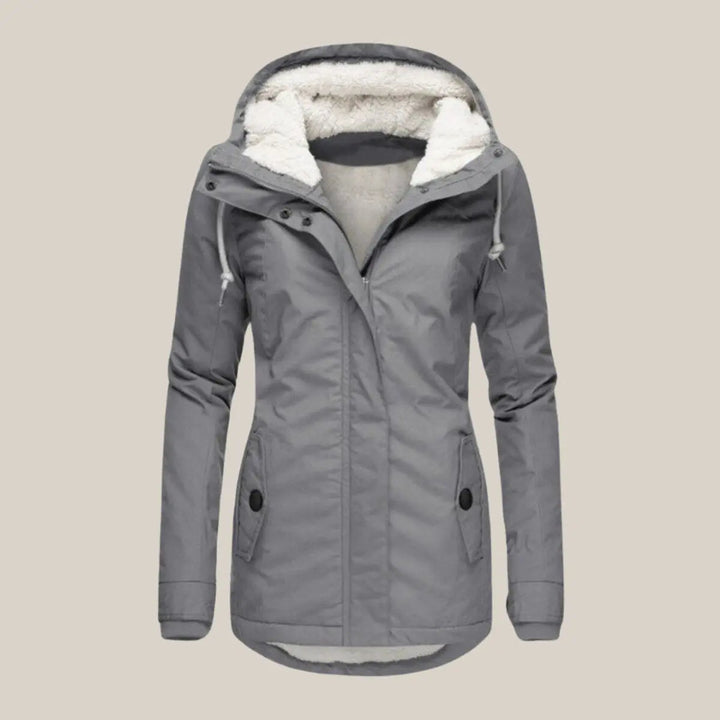 Warm fleece-lined women's quilted jacket, ideal for chilly autumn days.