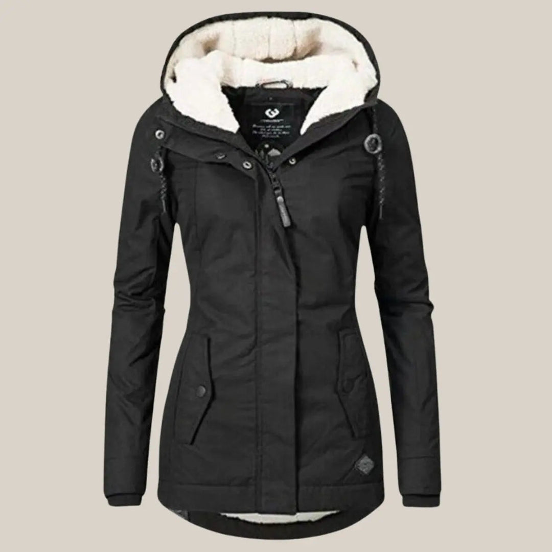 Durable women's quilted winter outerwear, warm and cozy for cold weather adventures.