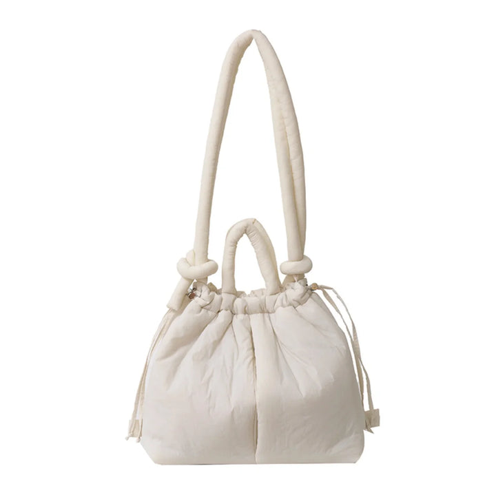 Chic quilted puffer bag for women, a stylish shoulder tote with convenient drawstring sides & knot strap.