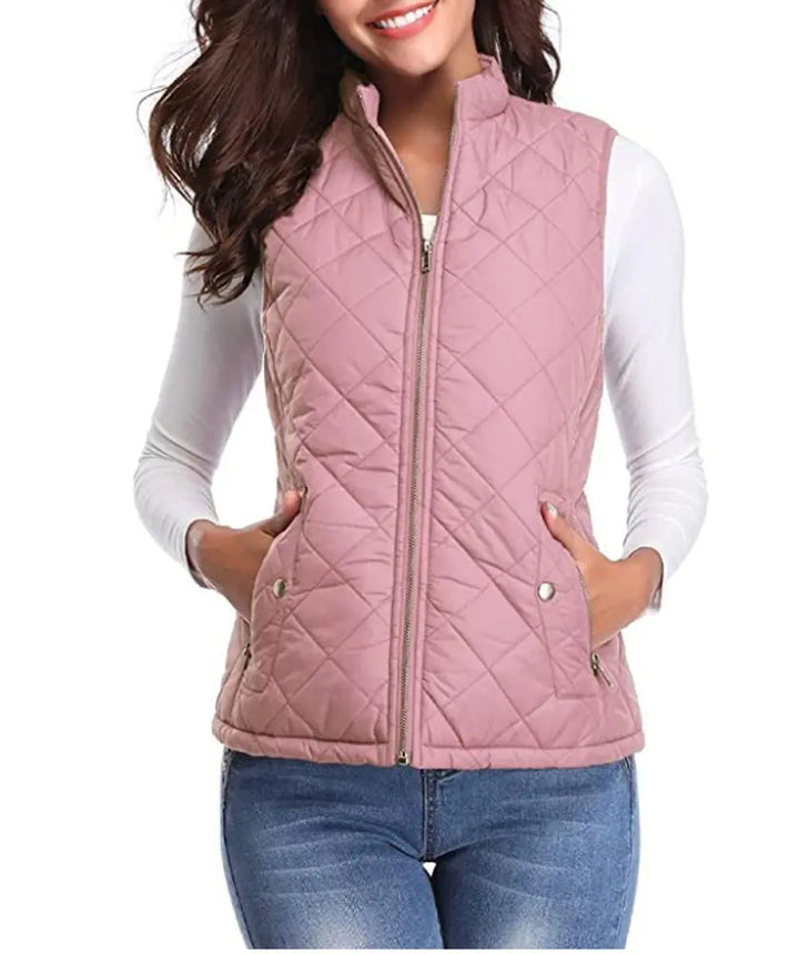 Women's quilted puffer vest with zip-up front, perfect for fall & spring layering.