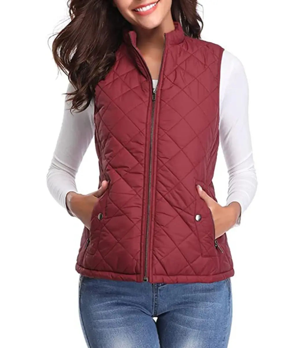 Stylish women's puffer vest with full zip closure, great for active & casual outfits.