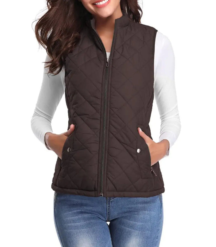 Versatile women's puffer vest, perfect for layering over long sleeves or under a jacket.