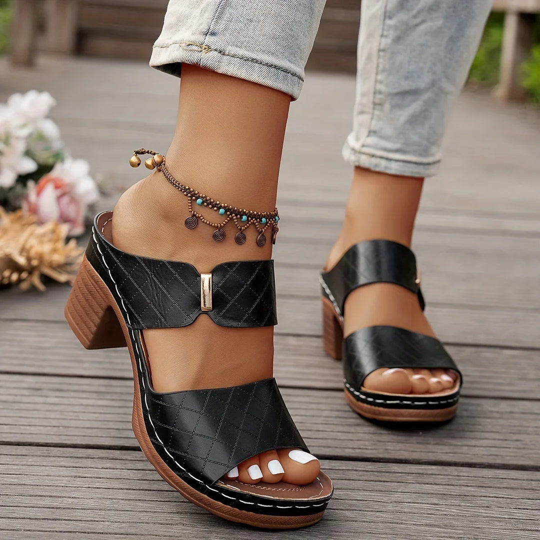 Quilted two-strap women's platform sandals with a comfortable block heel, great for summer.