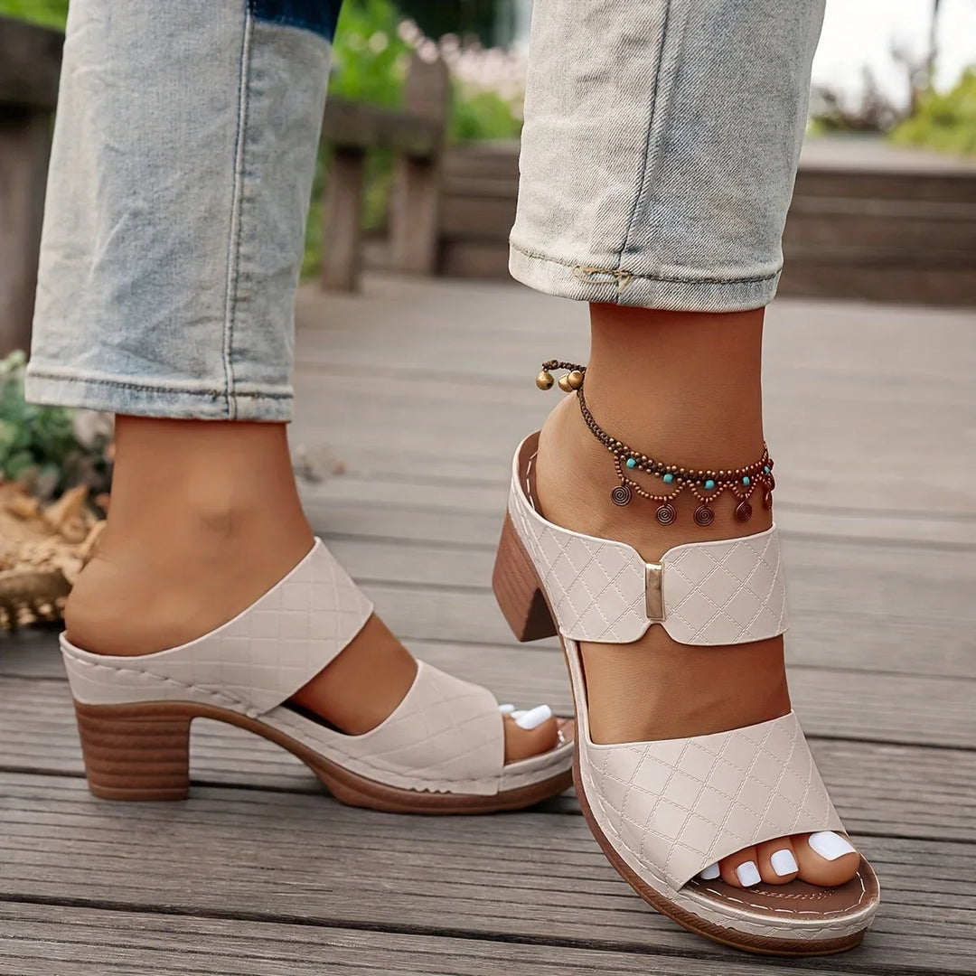 Summer-ready women's quilted two-strap platform sandals, elevated block heel for stylish comfort.