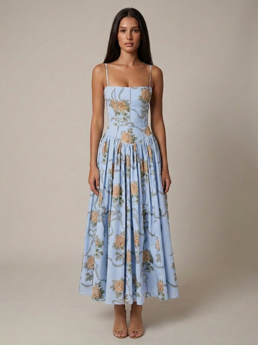 Summer women's midi dress: Quintessa corset top, spaghetti straps, and beautiful floral print, ideal for day wear.