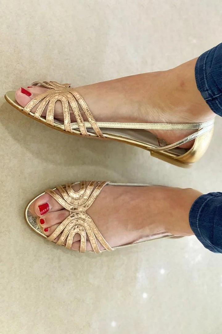 Comfortable women's slip-on sandals, ideal for vacation essentials & summer walking. Open-toe elegant design.