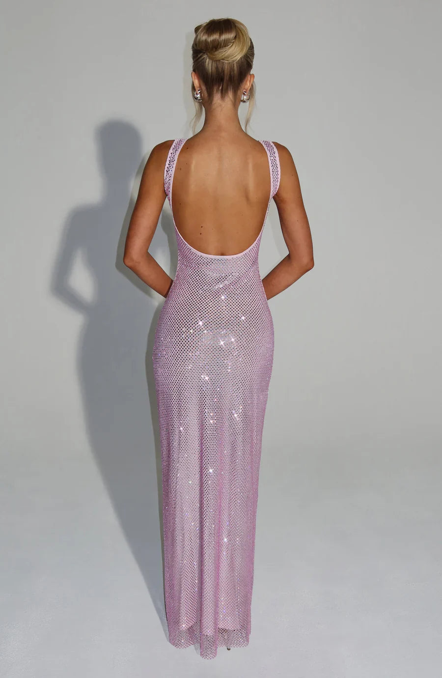 Backless embellished evening gown with train