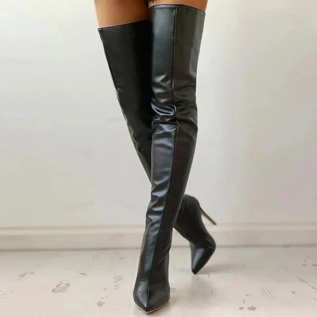 Fashionable black thigh high boots for women featuring a sexy pointed toe and stiletto heel