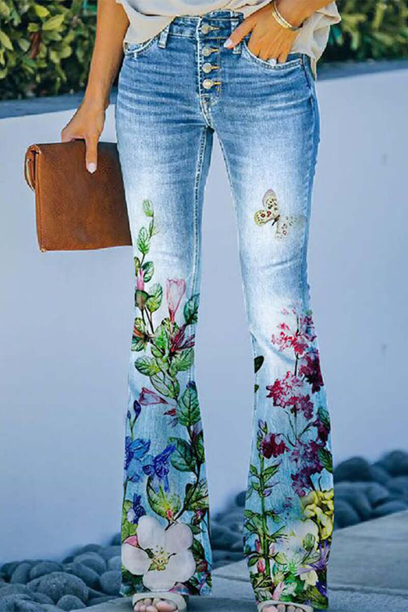 Detail of an embroidered pocket on women's blue floral regular fit jeans, perfect for casual style.