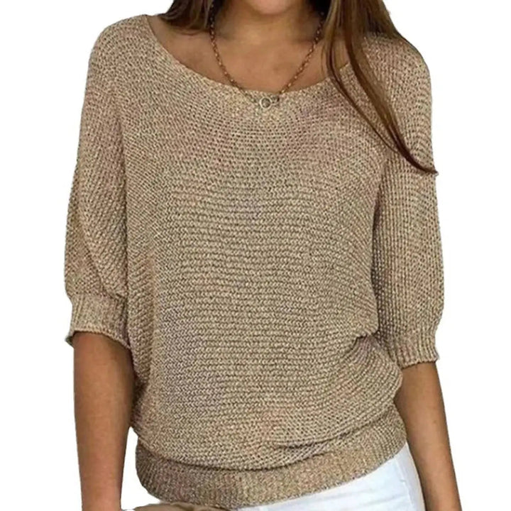 Women's relaxed batwing sleeve sweater, perfect for casual, comfortable everyday wear.