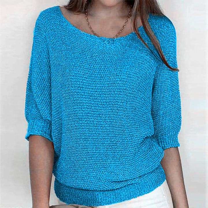 Comfortable women's scoop neck batwing sweater with a relaxed fit for daily fashion.