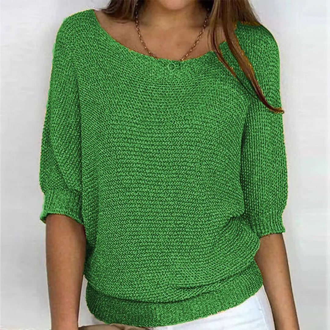 Fashionable women's batwing sleeve sweater, offering a relaxed and comfortable fit.