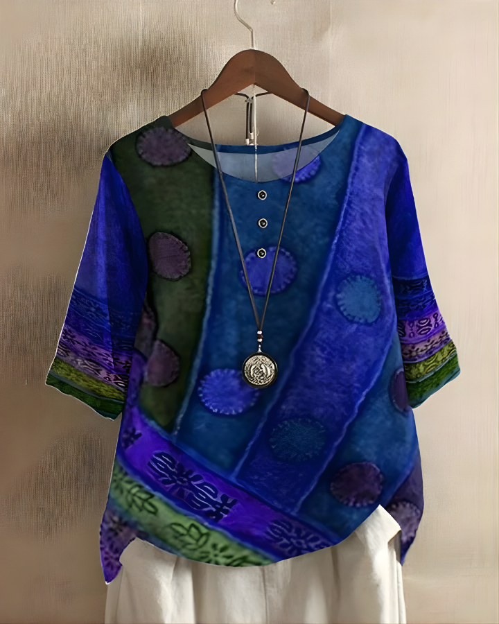 Relaxed fit women's summer top with a vibrant print, comfortable for casual bohemian wear.