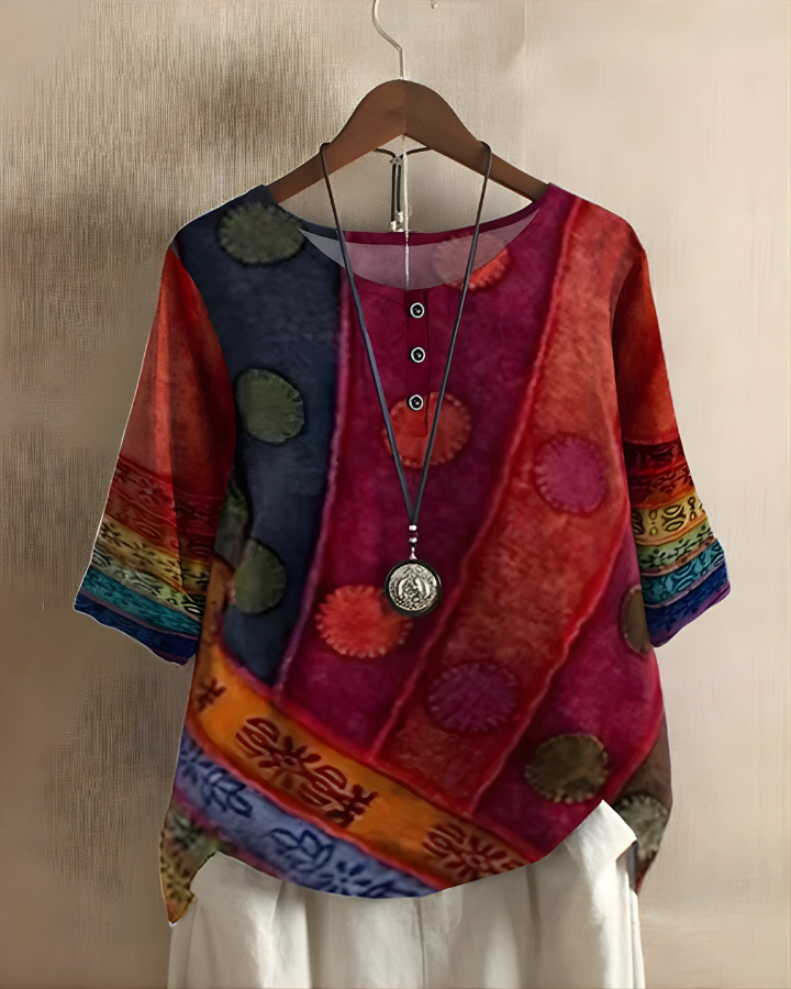 Women's relaxed boho summer top with vibrant print. Effortless casual style.