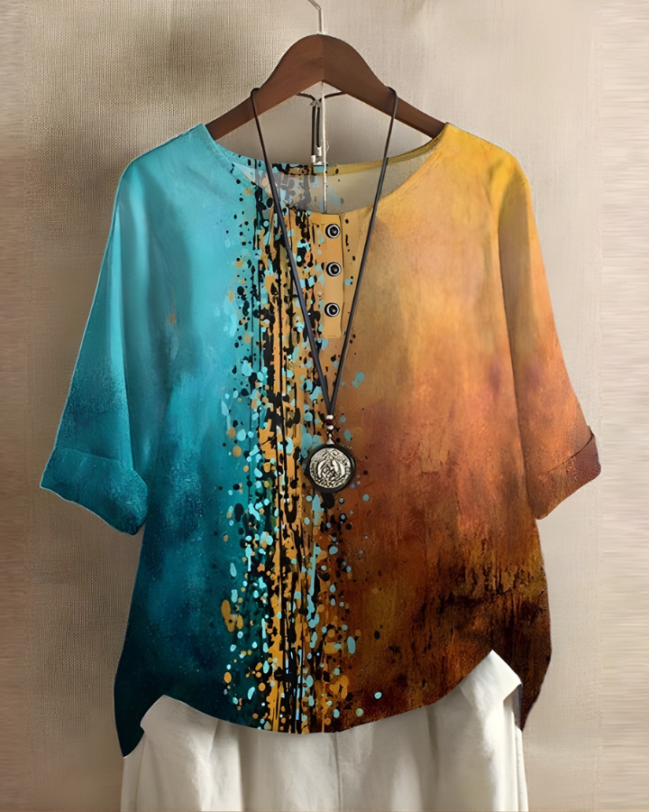 Bohemian women's summer top, relaxed fit, vibrant print. Perfect for easy, stylish wear.