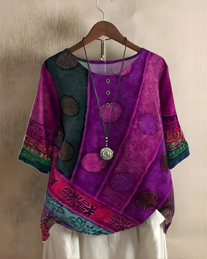 Casual women's summer top, relaxed fit with a vibrant bohemian print for easy style.
