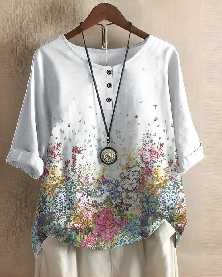 Stylish women's boho top with a vibrant print and relaxed, comfortable summer fit.